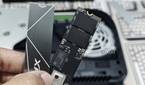 An image showing the XPG Gammix S50 LITE SSD and its heatsink.