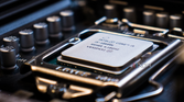 A close-up image of a CPU core i5, docked on a motherboard with the background blurred