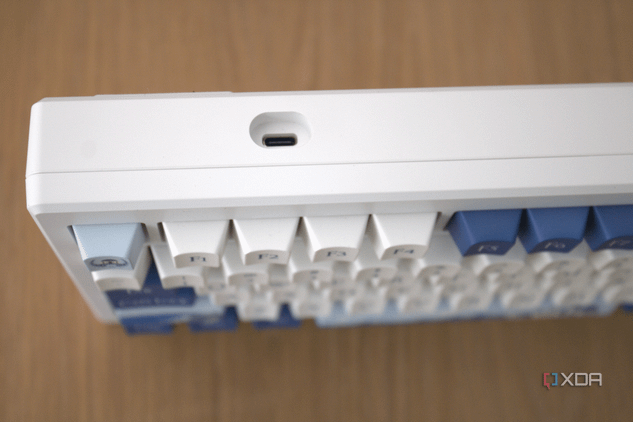 A top view of the Akko Santorini, displaying the USB-C charging port, with the keyboard keys blurred out