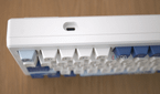 A top view of the Akko Santorini, displaying the USB-C charging port, with the keyboard keys blurred out