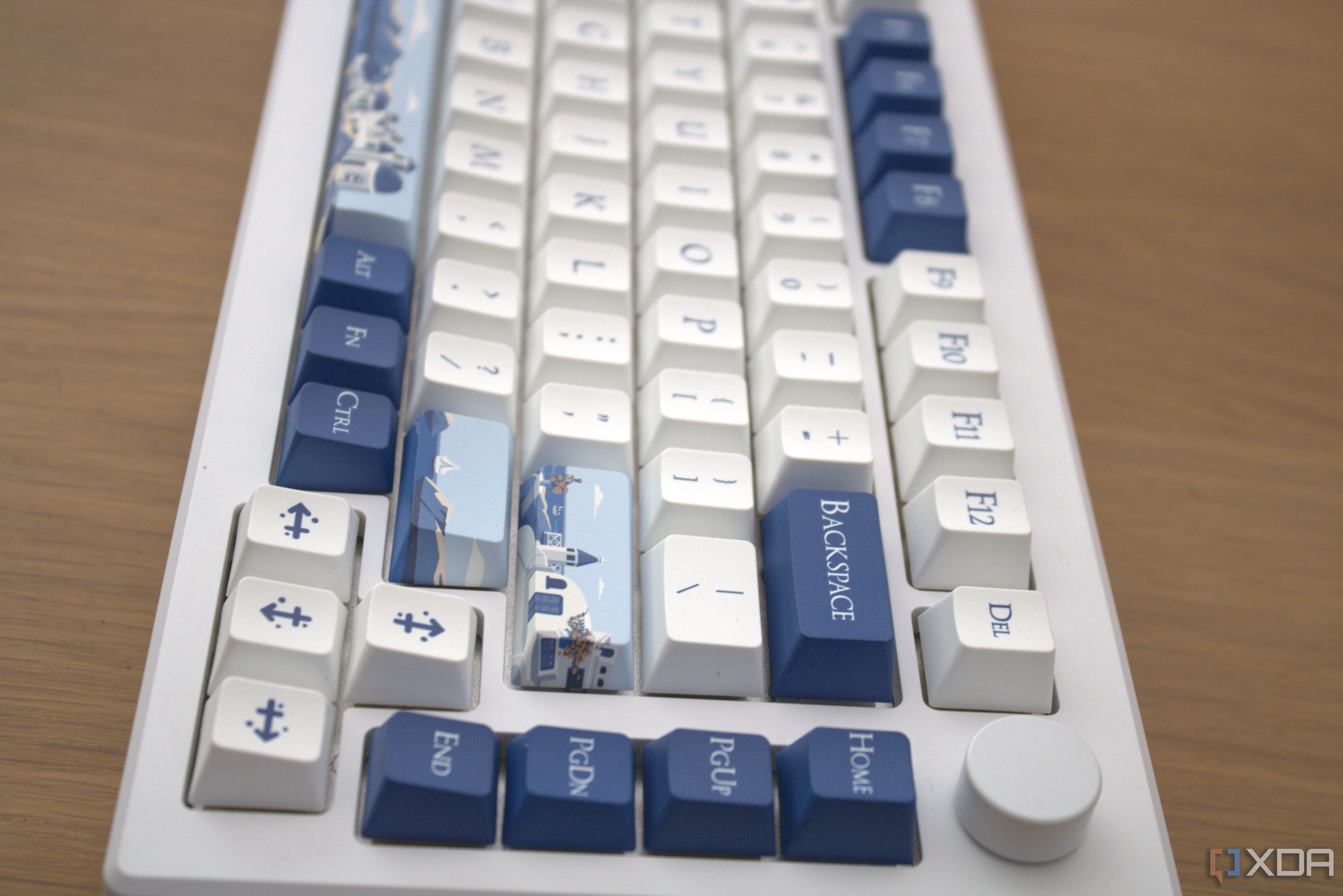 A side profile image of the Akko Santorini keyboard displaying the physical dial