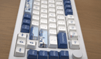 A side profile image of the Akko Santorini keyboard displaying the physical dial