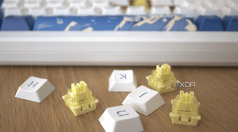 The Akko Santorini keyboard in the background with the keyboards switches and key caps in focus