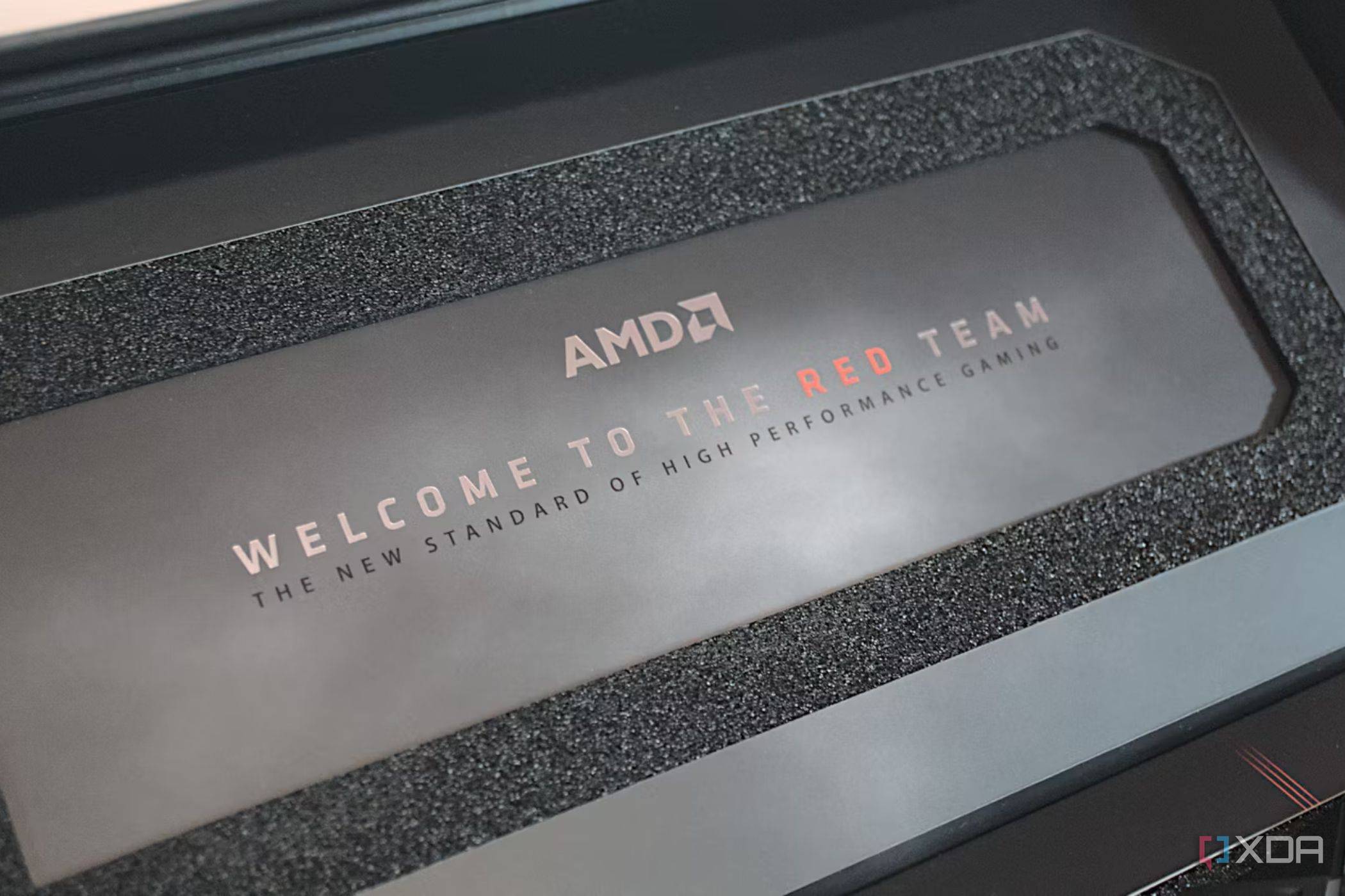An image showing the AMD Radeon 7900 XT box with AMD branding and a welcome message.