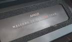 An image showing the AMD Radeon 7900 XT box with AMD branding and a welcome message.