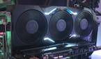 An image showing an AMD Radeon RX 7900 XTX GPU that's installed on a test bench.
