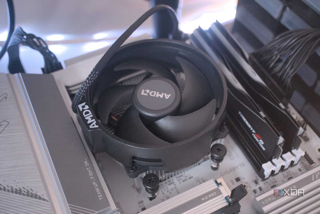AMD Ryzen 5 8600G installed with its cooler