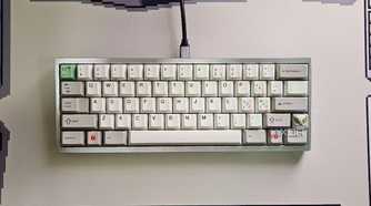An image showing a mechanical keyboard kept on a deskmat.