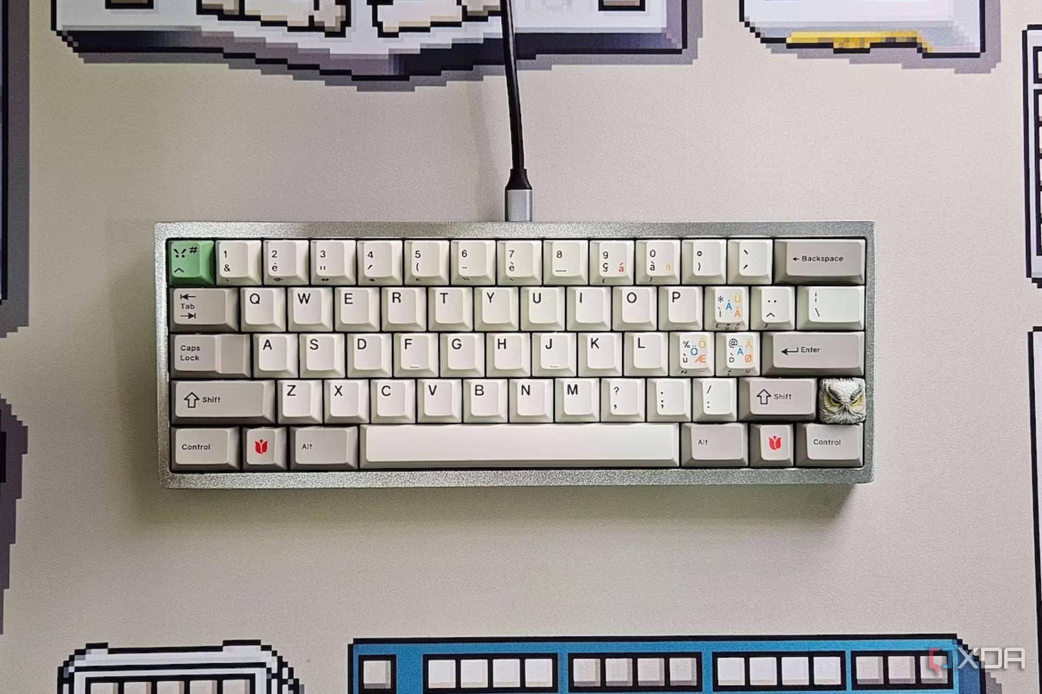 An image showing a mechanical keyboard kept on a deskmat.