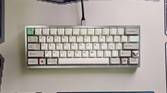 An image showing a mechanical keyboard kept on a deskmat.
