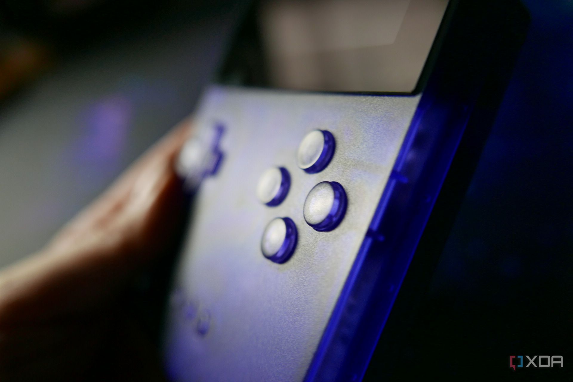 A side view of the Analogue Pocket that shows off the ABXY buttons.