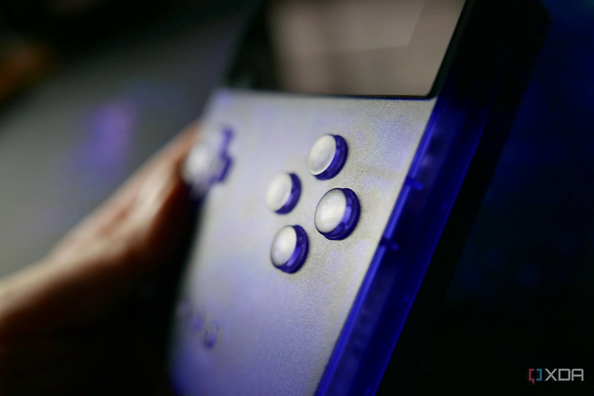 A side view of the Analogue Pocket that shows off the ABXY buttons.