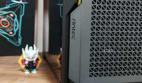 An image showing the Antec branding on the P20C case that's kept on a desk next to an action figure.