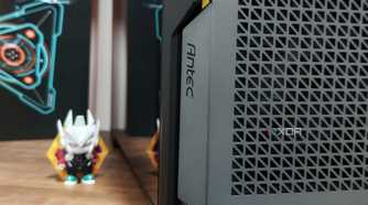 An image showing the Antec branding on the P20C case that's kept on a desk next to an action figure.