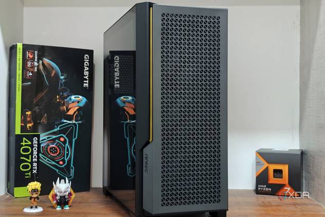 An image showing the Antec P20C ARGB PC case kept on a table with a GPU and CPU retail next to it.