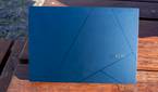 Rear view of the Asus Zenbook 14 OLED with the lid open