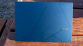Rear view of the Asus Zenbook 14 OLED with the lid open