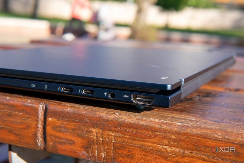 Close-up view of the ports on the Asus Zenbook 14 OLED, including HDMI, Thunderbolt 4, and 3.5mm headphone jack