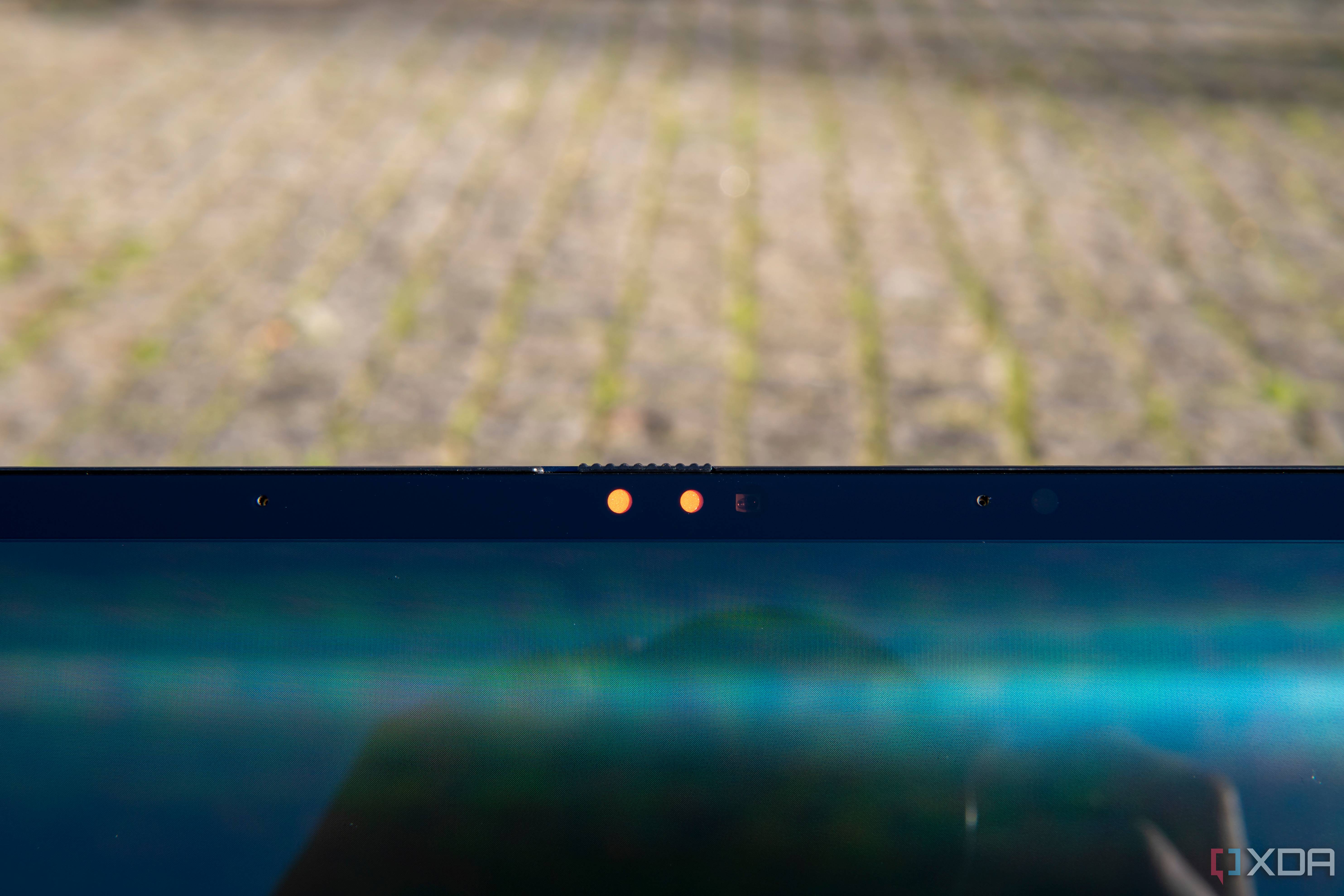 Close-up of the webcam on the Asus Zenbook 14 OLED with the privacy cover closed