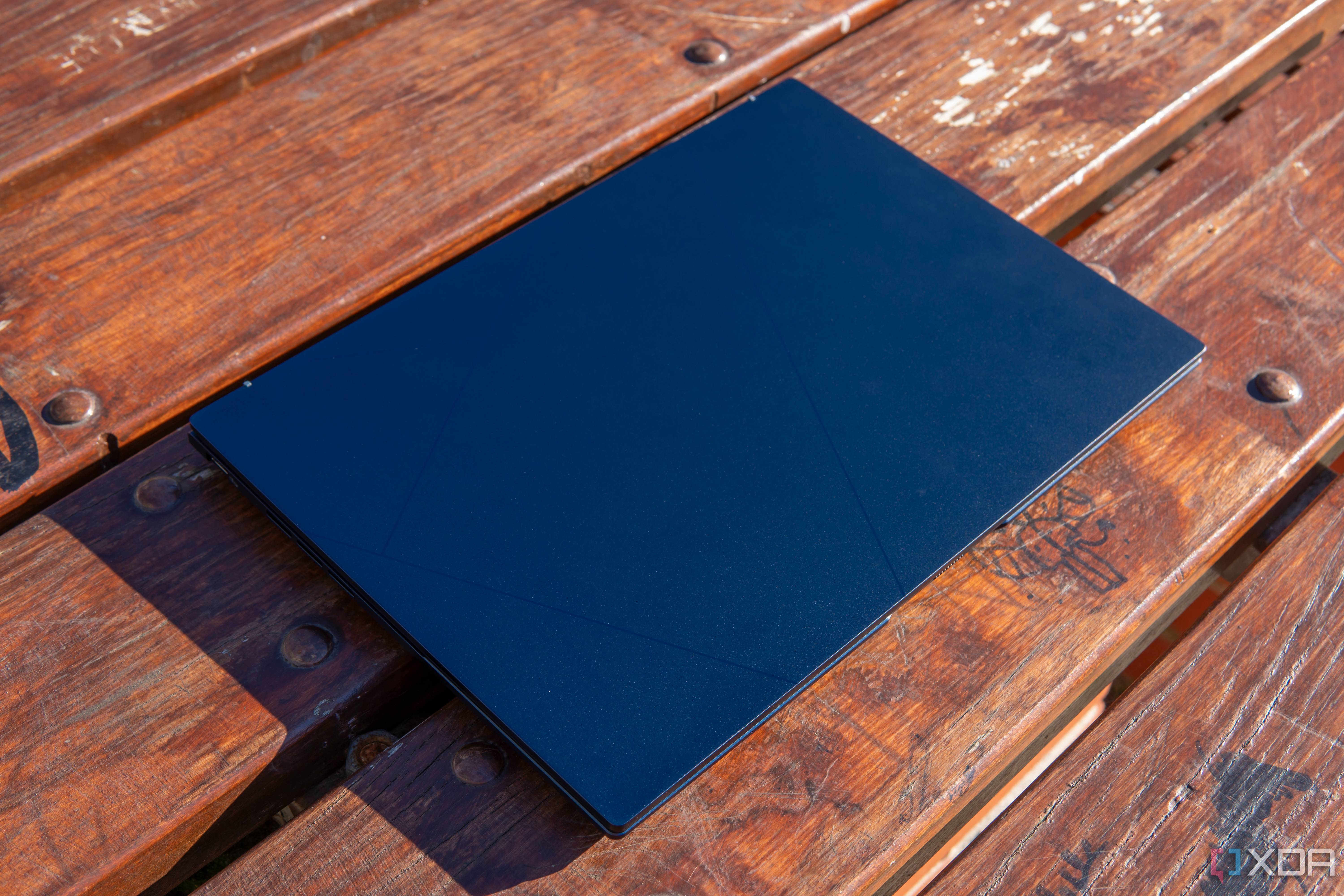 Angled view of the Asus Zenbook 14 OLED with the lid closed