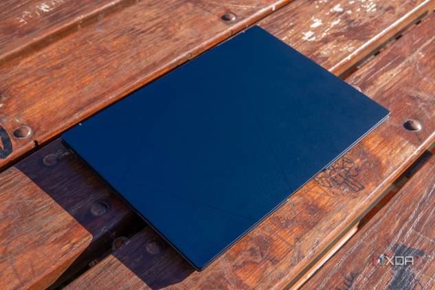 Angled view of the Asus Zenbook 14 OLED with the lid closed