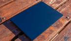 Angled view of the Asus Zenbook 14 OLED with the lid closed