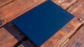 Angled view of the Asus Zenbook 14 OLED with the lid closed