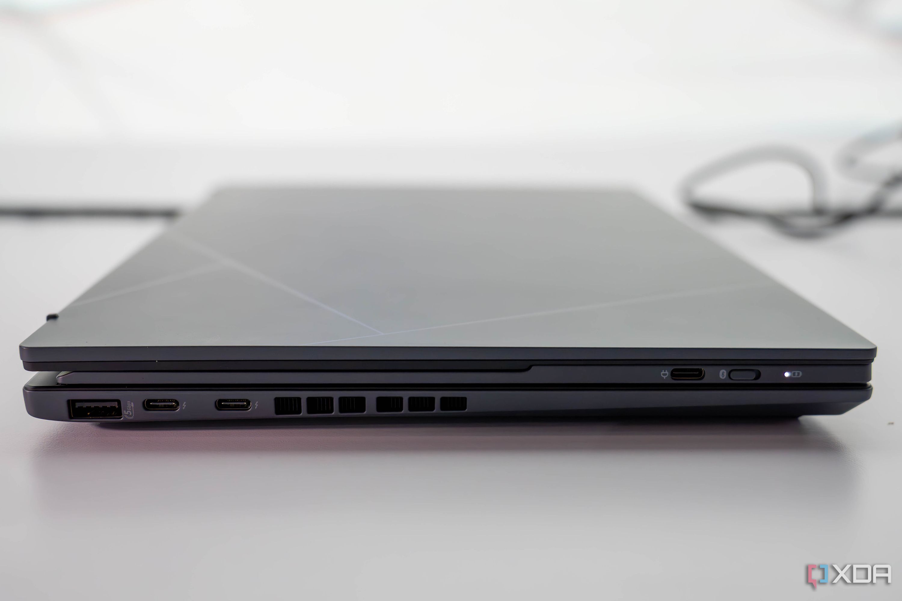 Asus Zenbook Duo closed with keyboard inserted inside