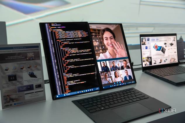 Asus Zenbook Duo with the screens shown side by side with a wireless keyboard in front of it