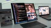 Asus Zenbook Duo with the screens shown side by side with a wireless keyboard in front of it