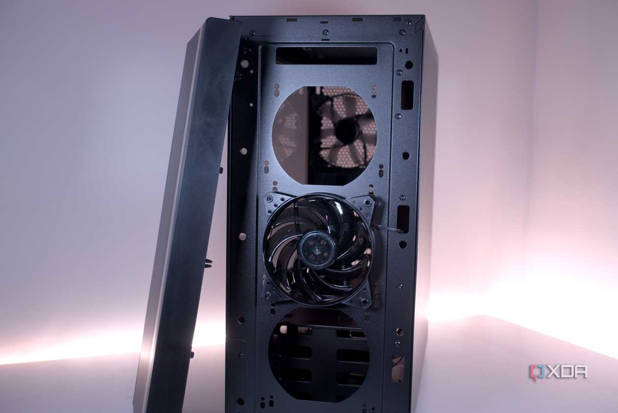 Behind the Cooler Master MasterBox NR600 front mesh panel