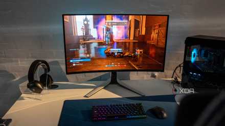 Maximum avid gamers are not in fact the use of DLSS 4.5's new transformer style — this is why and tips on how to repair it Dell QD-OLED monitor on a desk next to PC hardware