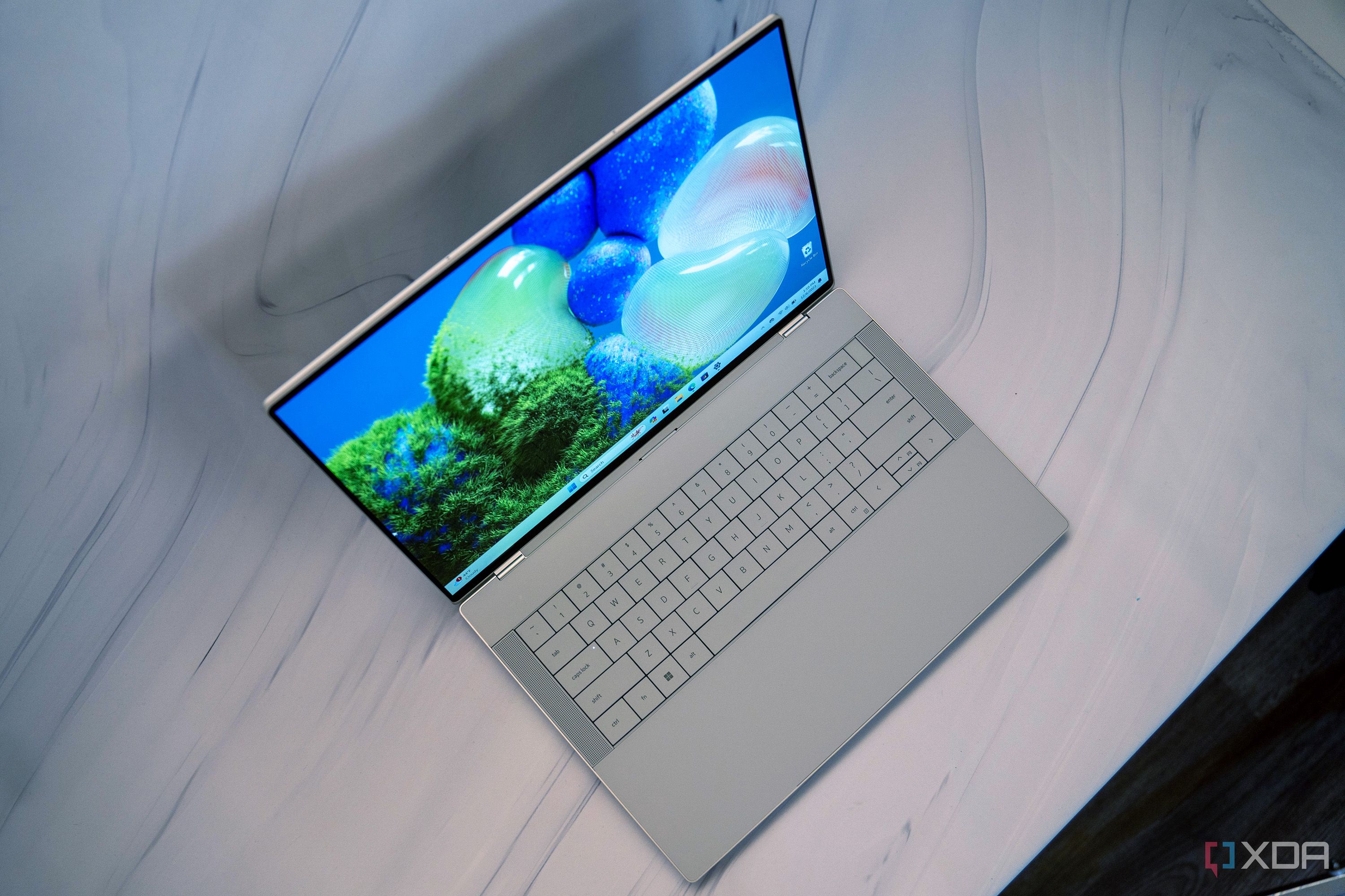 A Platinum Dell XPS 14 seen from above at an angle.
