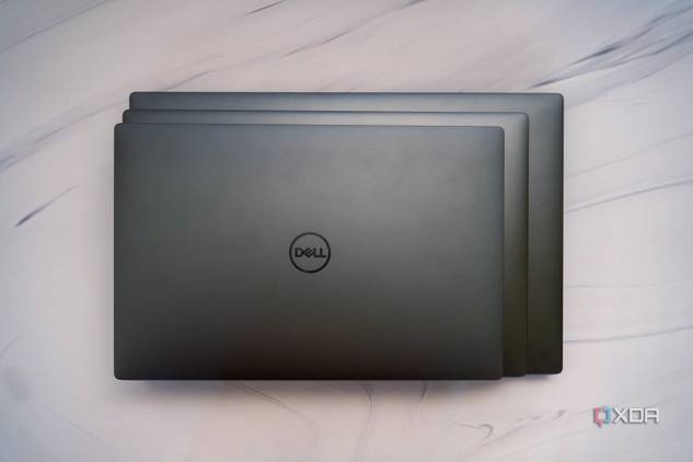 Overhead view of the The Dell XPS 13, 14, and 16 stacked on top of each other