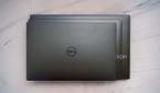 Overhead view of the The Dell XPS 13, 14, and 16 stacked on top of each other