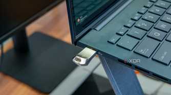 A flash drive plugged into a laptop