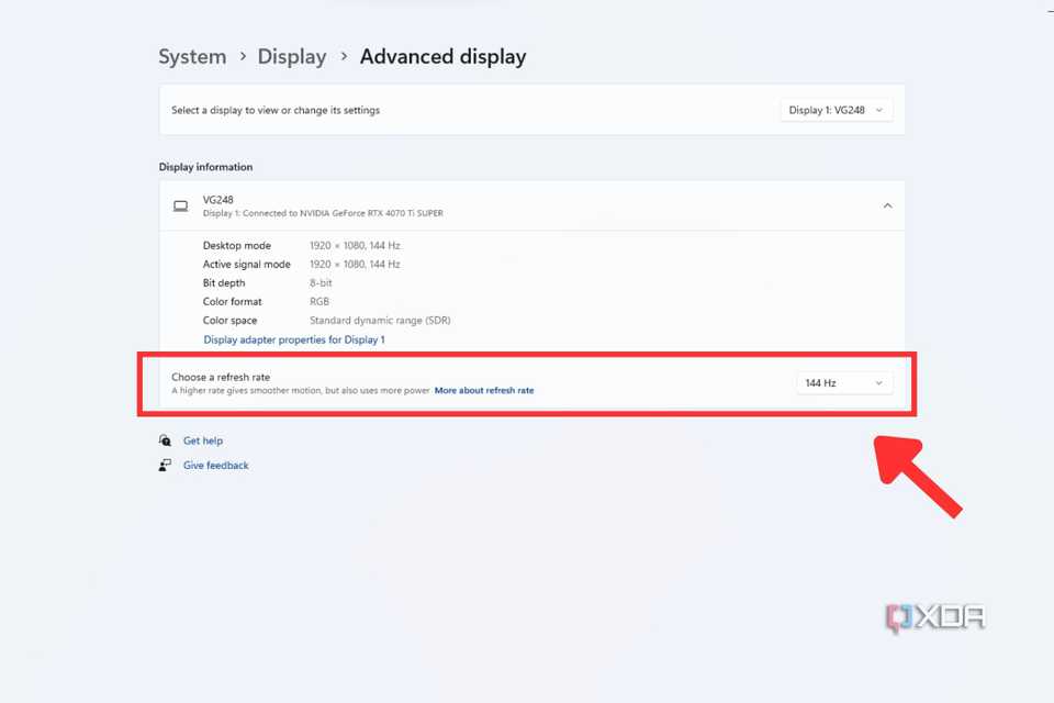 A screenshot showing the highlighted Choose refresh option in Windows display Settings.