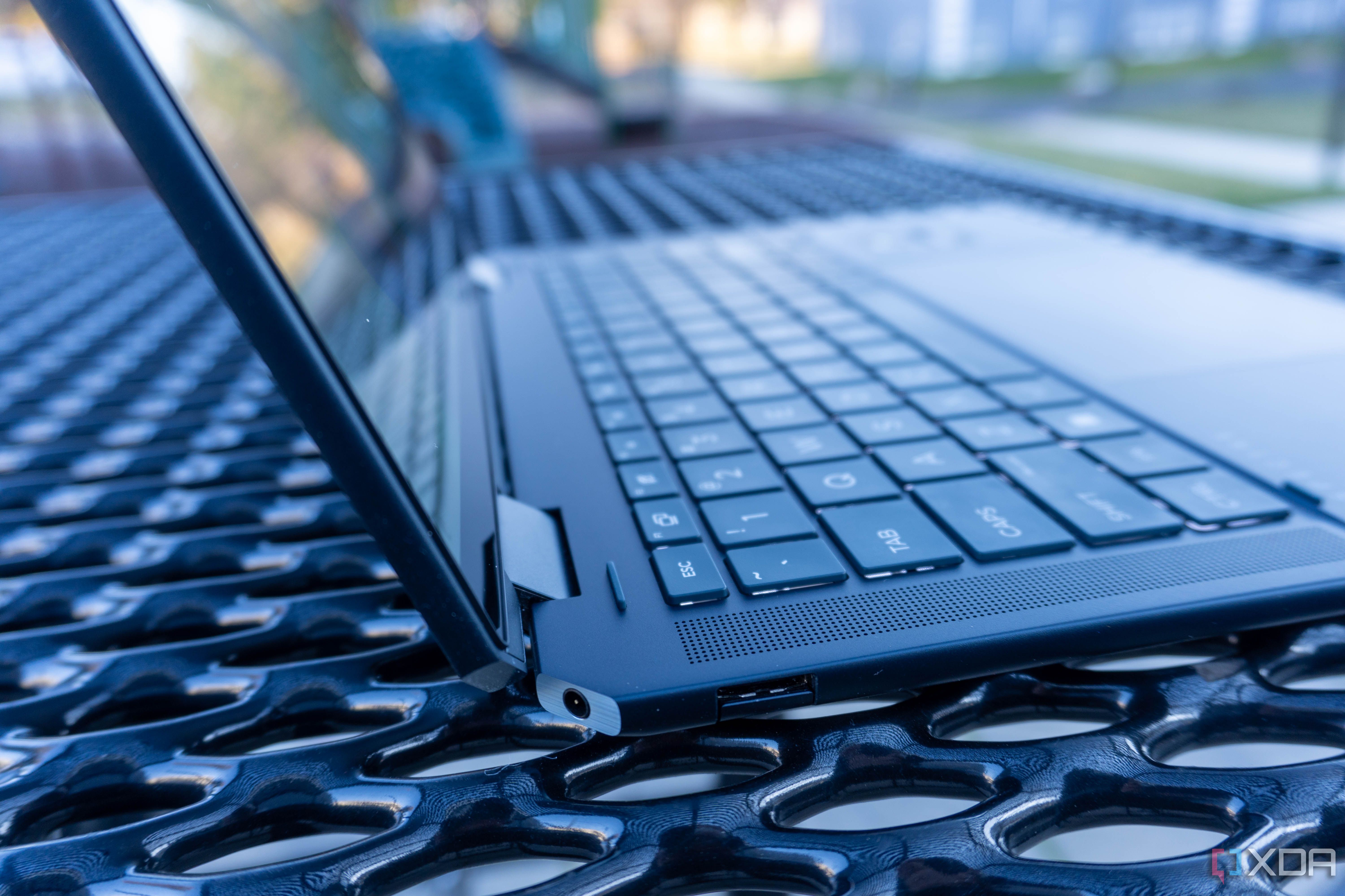 Close-up view of the headphone jack and USB Type-A port on the HP Spectre x360 14