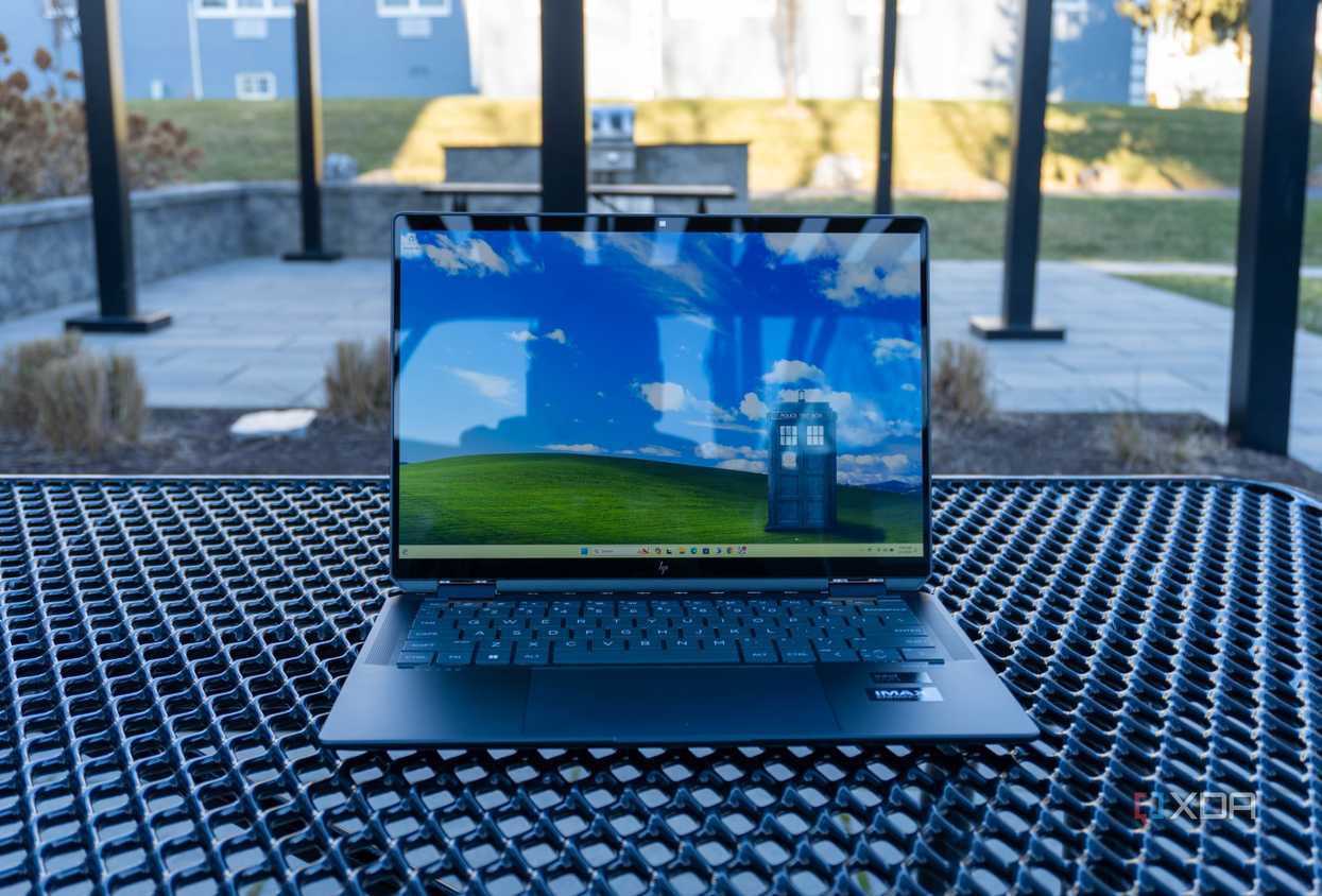 Front view of the HP Spectre x360 14 on a metal table