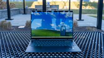 Front view of the HP Spectre x360 14 on a metal table