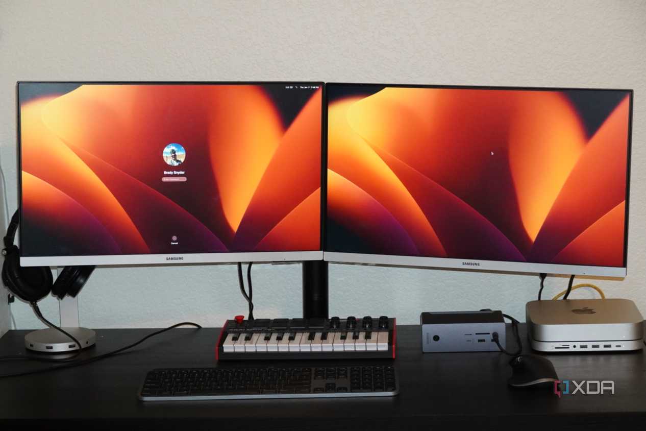 The front of a desk setup using the Insignia dual monitor mount.
