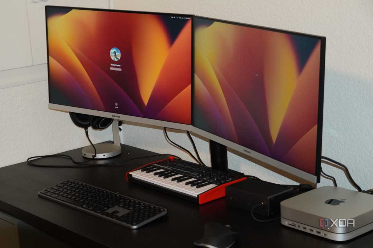 Two monitors propped up on the Insignia monitor mount.