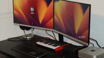 Two monitors propped up on the Insignia monitor mount.