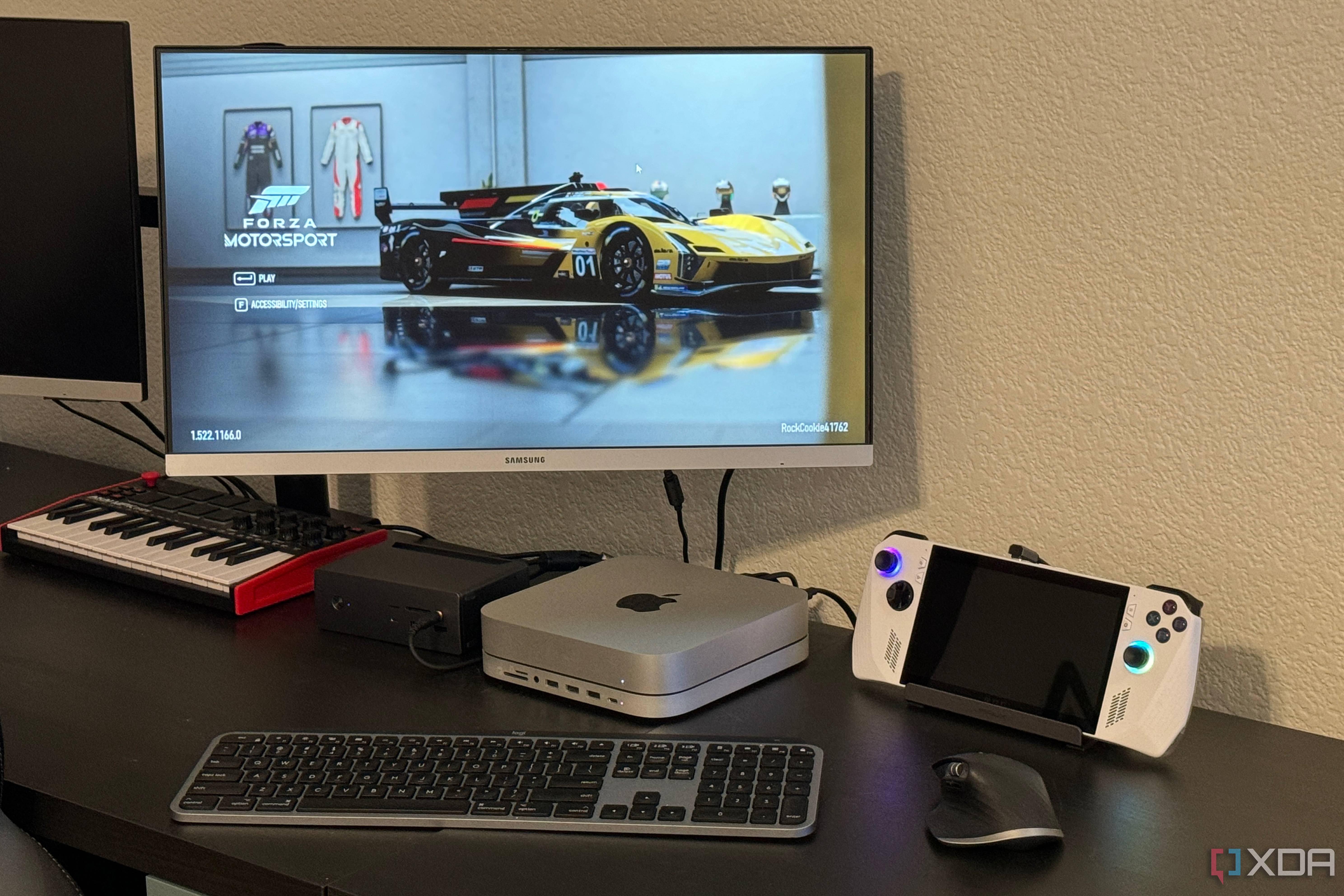 The ROG Ally as part of a desk setup with accessories.