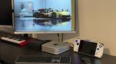 The ROG Ally as part of a desk setup with accessories.