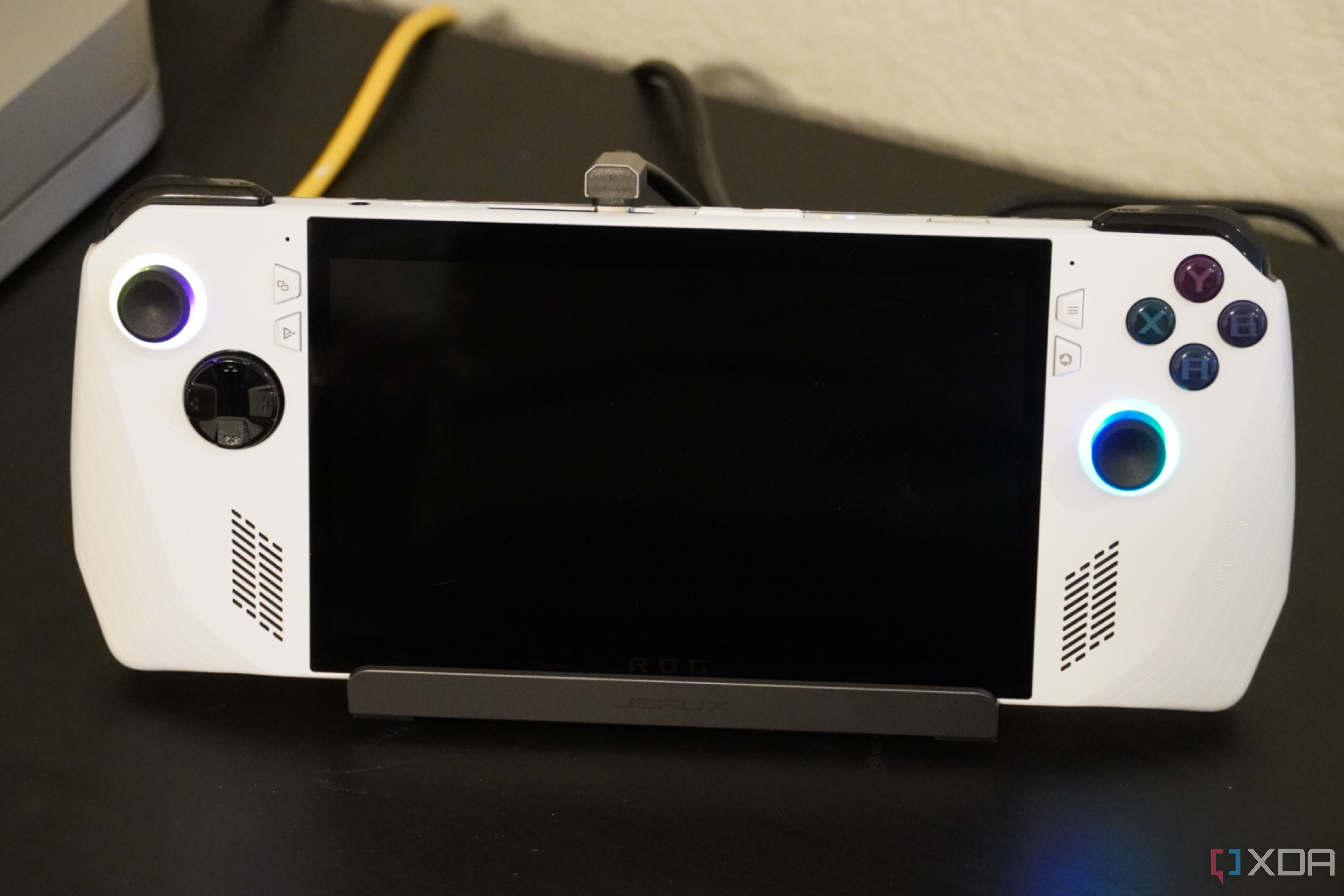 A close-up of the Jsaux dock connected to cables.