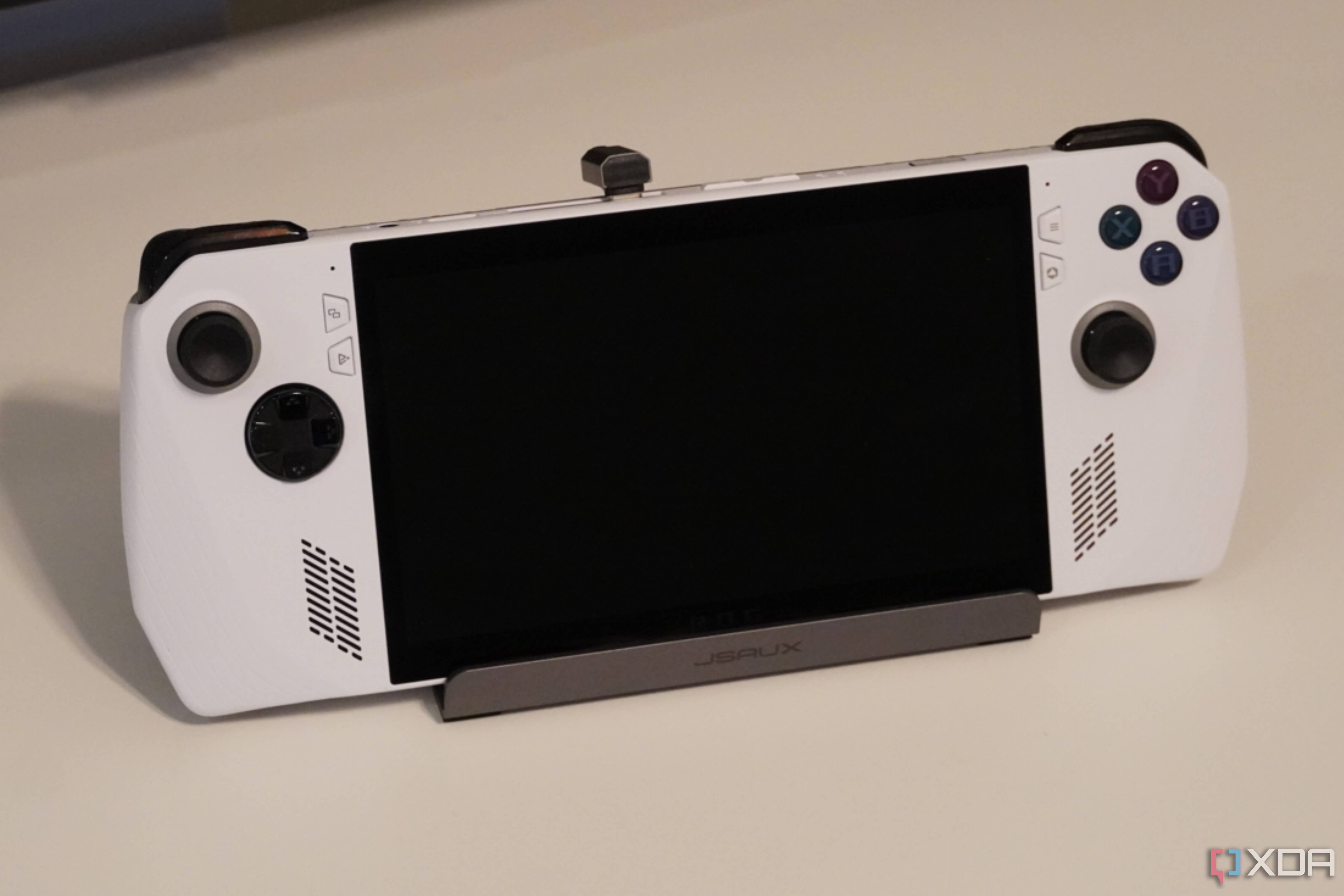 An ROG Ally on a Jsaux gaming handheld dock.