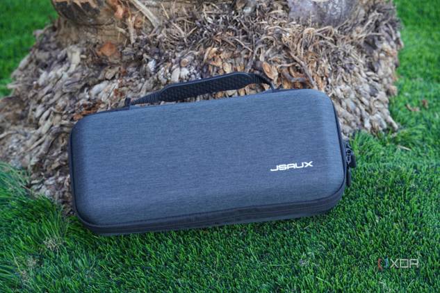 The Jsaux Carrying Case resting against a palm tree.