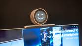 A Lenovo ThinkBook 13x Gen 4 with a concept Magic Bay accessory with a small screen that displays a smiley face