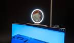A Lenovo ThinkBook 13x Gen 4 with a concept Magic Bay accessory with a ring light